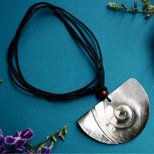 Carved pearl shell with leather choker 4