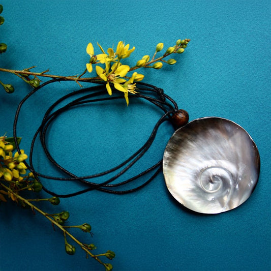 Carved pearl shell with leather choker 6