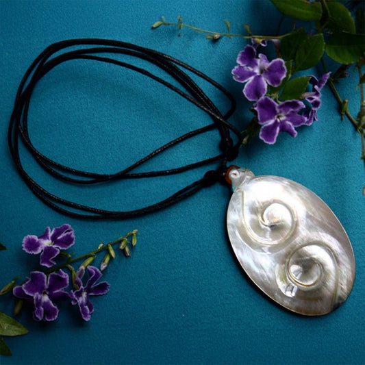 Carved pearl shell with leather choker 8