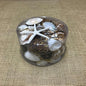 Shell cylinder - Black, tan, cream and white