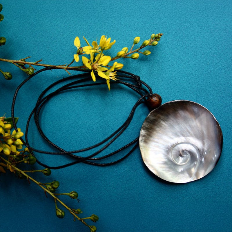 Carved pearl shell with leather choker 6