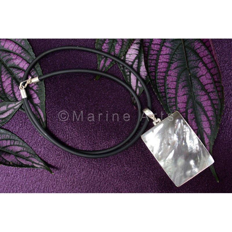 Carved pearl shell with silver without cord 12